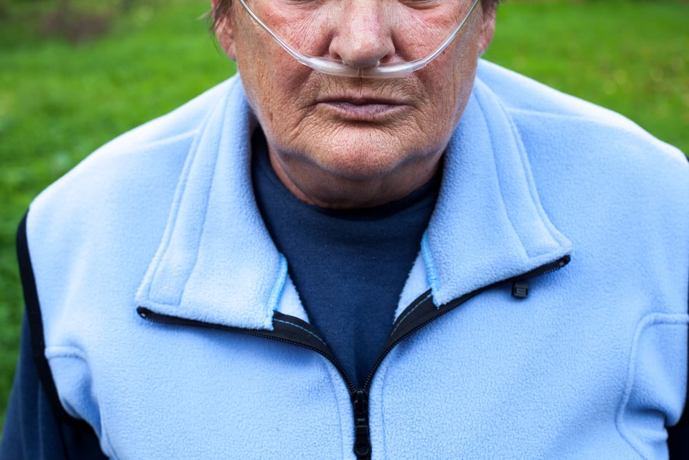 man using oxygen concentrator 